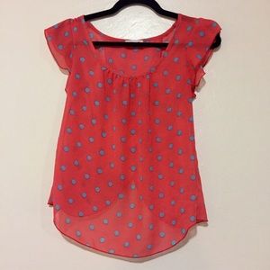 Flowy orange chiffon blouse with polka dots